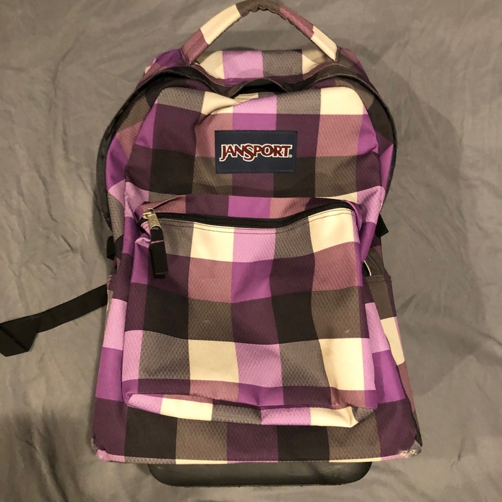 Backpack with two compartments, wheels and straps